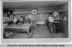 Photograph of students working in the Printing Office in the Knowles Industrial Building at Atlanta University, Atlanta, Georgia, circa 1900