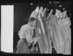 Manpower. Negro aircraft propeller workers. A batch of propeller blades is rushed from one operation to another by one of the many Negro workers in a large Eastern airplane propeller plant. Curtiss-Wright Propeller Division. Caldwell, New Jersey