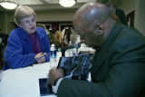 John Lewis signing his book at an event jointly hosted by Alabama A&M University and the University of Alabama in Huntsville.