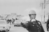 Thumbnail for Scene at the foot of the Edmund Pettus Bridge in Selma, Alabama, after civil rights marchers were beaten and gassed by Alabama state troopers and Dallas County deputies on Bloody Sunday.