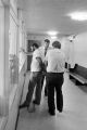 Sergeant Clifford Vasser and Lieutenant Doug Acker booking Anthony Ray Hinton on capital murder charges at the city jail in Bessemer, Alabama.