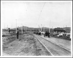 Procession of cars on Glendale Boulevard west of the Sunset Boulevard Bridge, Los Angeles, ca.May 14, 1904