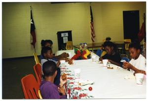 Children Eating During Christmas Party