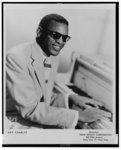 [Ray Charles, half-length portrait, seated at piano, facing right]