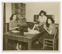 Thumbnail for Juanita Traylor, Lillian Graves, and Andrea Thompson, Panther Newspaper Staff in an Office, 1951