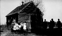 Old one room school (white). Trip of Inspection. J.D.Eggleston and Superintendent Owen