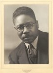 [Artist Aaron Douglas, head-and-shoulders portrait, facing front]