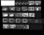 Set of negatives by Clinton Wright including mothers of debutants, Leonard's party at Carver House, wig for V.L. Williams, Kit Carson girls, play at Madison, U.M. Day, and Ronnie Hall, 1965