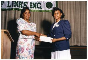 Ellette Harold Receiving Award at Salute to Youth Awards Program