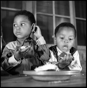 Young Boys Eating Cake