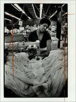 Marion Howard sewing mops for the Wilen Manufacturing Company, October 26, 1981