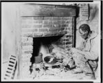 The roof over his head was saved by the Red Cross, and his food and seeds for his garden plot also were from the Red Cross. Albert Wetherspoon, 70 year-old colored man, is a beneficiary of the drought relief work. A foreclosure on his little farm was put off through Red Cross intervention