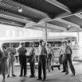 Police officers standing outside a bus to prevent Freedom Riders from boarding at the Greyhound station in Birmingham, Alabama.