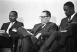 Congressman Carl Elliott seated with two other men during a meeting of educators at Alabama State College in Montgomery, Alabama.