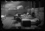 Interior of cotton compress where sick Negro flood refugees are housed during the flood, Forrest City, Arkansas