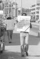 Picketer protesting at the county courthouse in Mobile, Alabama, during the investigation into the murder of Michael Donald.