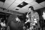 Man singing to Jackée Harry at the Pied Piper nightclub, Los Angeles, 1987