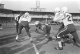 Players on the field during the state championship football game between Carver High School of Montgomery and Mobile County Training School, at Hartwell Field, Mobile, Alabama.