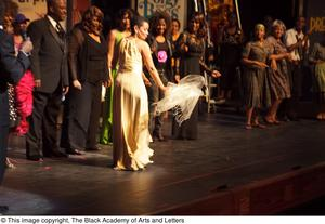 Curtis King, Erykah Badu, and Dereque Whiturs on Stage with Performers