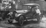 Photographs of automobiles from the William E. Baker glass negative collection.
