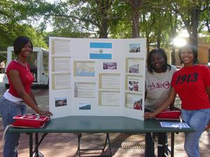 Students at Salvador booth, 2005 Carnival