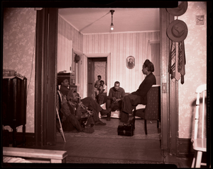 Seated group of men and women: photonegative.