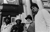 Photographs of attorneys James U. Blacksher and Franz Marshall, cooperating attorneys for the NAACP Legal Defense and Educational Fund (LDF), with their wives in New York City.