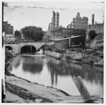 [Richmond, Va. View on James River and Kanawha Canal near the Haxall Flour Mills; ruins of the Gallego Mills beyond]