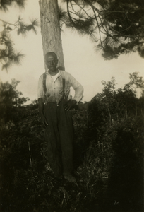 Gullah man standing in front of tree