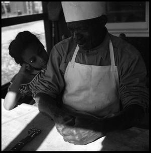 Oliver Jacobs and Granddaughter Playing Dominoes