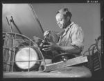 Fort Knox. Negro mechanics. A good job on the air cleaner of an army truck at Fort Knox, Kentucky. This Negro soldier, who serves as truck driver and mechanic, plays an important part in keeping army transport fleets in operation