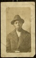 Photograph identification of an African-American man with coat and hat, for the U.S. Navy Yard, Philadelphia, undated.