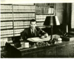 Law School Dean L. Scovel Richardson in his office