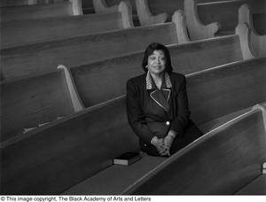 Photograph of Dorothy N. Cole Davis seated in pews #2