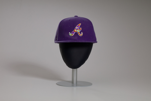 Purple Atlanta Braves baseball cap owned by Big Boi