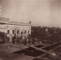 On the roof during the construction of the south wing of the Capitol in Montgomery, Alabama.