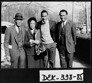 Photograph of Willie Johnson and his wife with their grandsons, Lithonia, DeKalb County, Georgia, spring 1984