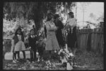 [Untitled photo, possibly related to: Children of Negroes dressed in Sunday best for ceremonies, memorial services. All Saint's Day, New Roads, Louisiana]