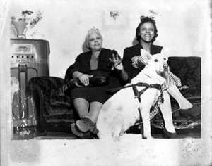 Geraldine Lowhorn (right) with her Seeing Eye dog