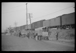 [Untitled photo, possibly related to: Day laborers being hired for cotton picking on Mississippi and Arkansas plantations. Between four and six-thirty every morning during the season, near the Hallan Bridge in Memphis, Tennessee, crowds of Negroes in the streets gather and are loaded into trucks by drivers who bid, and offer them anywhere from fifty cents to one dollar per day]