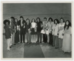 Group of youngsters holding trophies