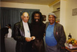 Roland Watts with two others