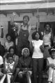 Edward Rudolph and others, standing on the porch of the Autauga County Improvement Association office in Prattville, Alabama, on the day of a civil rights march.