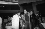 David "Sinbad" Adkins posing for a group portrait with three women at a Black Women's Forum, Los Angeles, 1989