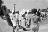 Klansmen at the city limits of Cullman, Alabama, awaiting the arrival of a march organized by the Southern Christian Leadership Conference to protest the upcoming trial of Tommy Lee Hines.