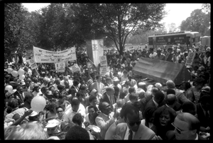 Speakers arriving at the 25th Anniversary of the March on Washington Jesse Jackson, Coretta Scott King (front center), and other speakers approach the stage through the crowd