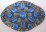 Semi-oval brooch with blue faux gems