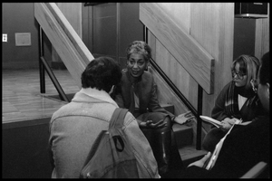 June Jordan, sitting on steps, talking