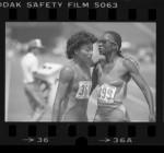 Florence Griffith and Valerie Brisco-Hooks after running 400 meters at 1984 Olympic trials in Los Angeles, Calif