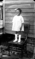 Individual portraits of African American children taken outdoors, from the William E. Baker glass negative collection.